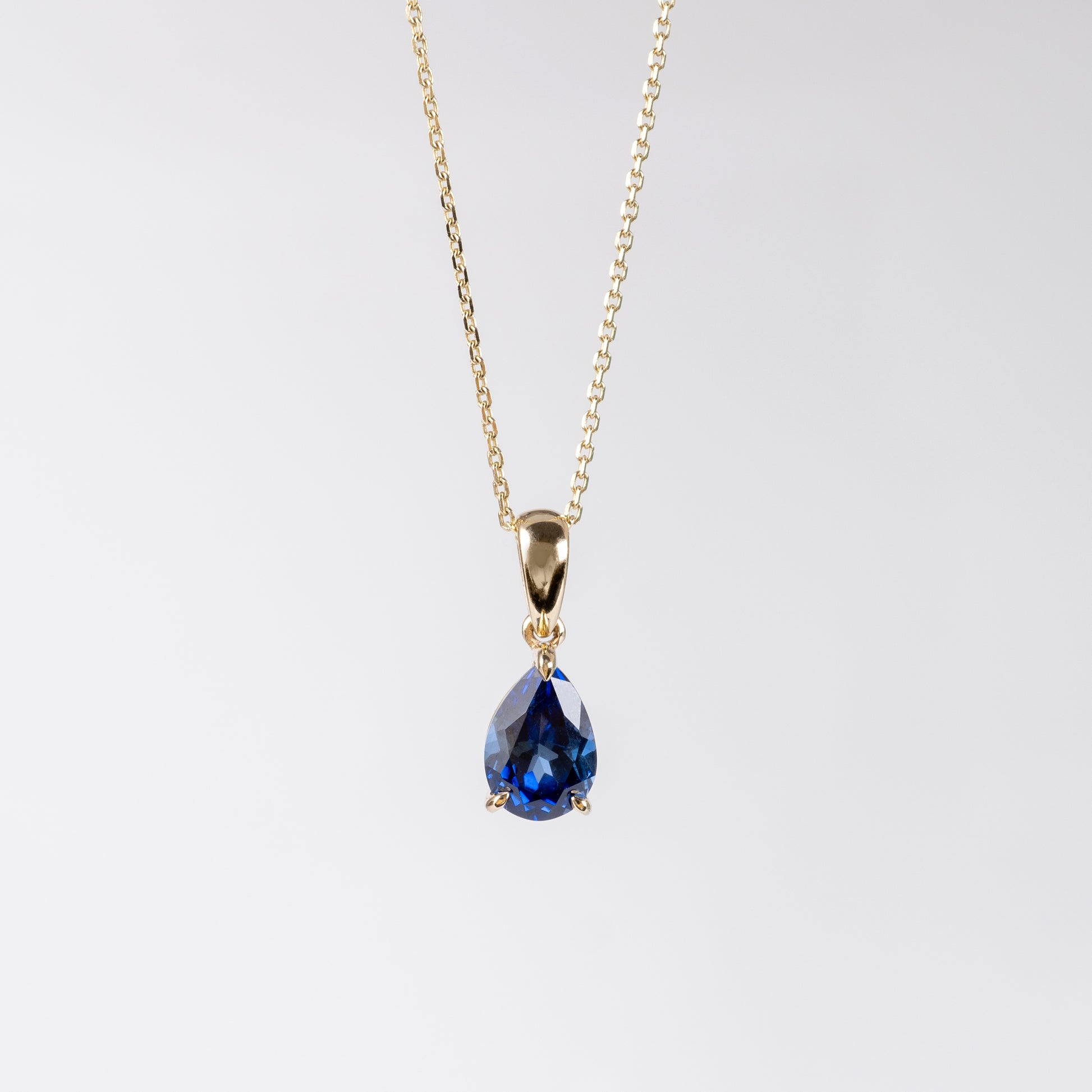 9ct Gold Pear Cut Blue Sapphire Solitaire Pendant Necklace - Hunters Fine Jewellery