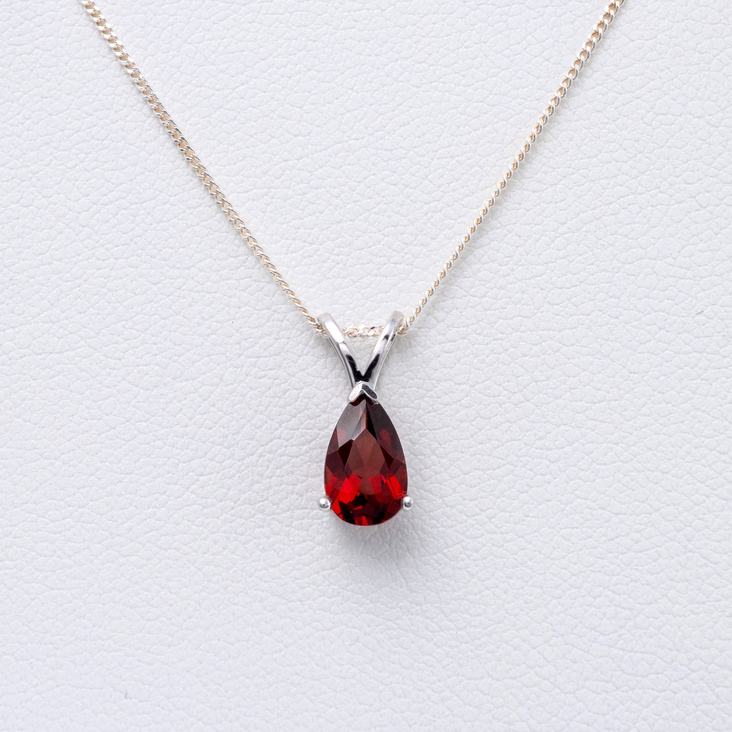 Garnet teardrop pendant with V-bale on adjustable chain