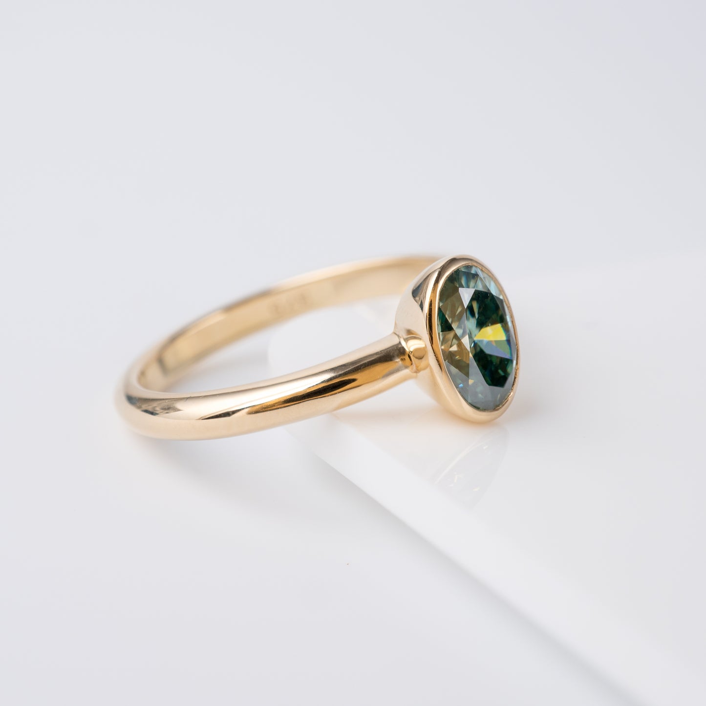 teal moissanite ring 9ct gold