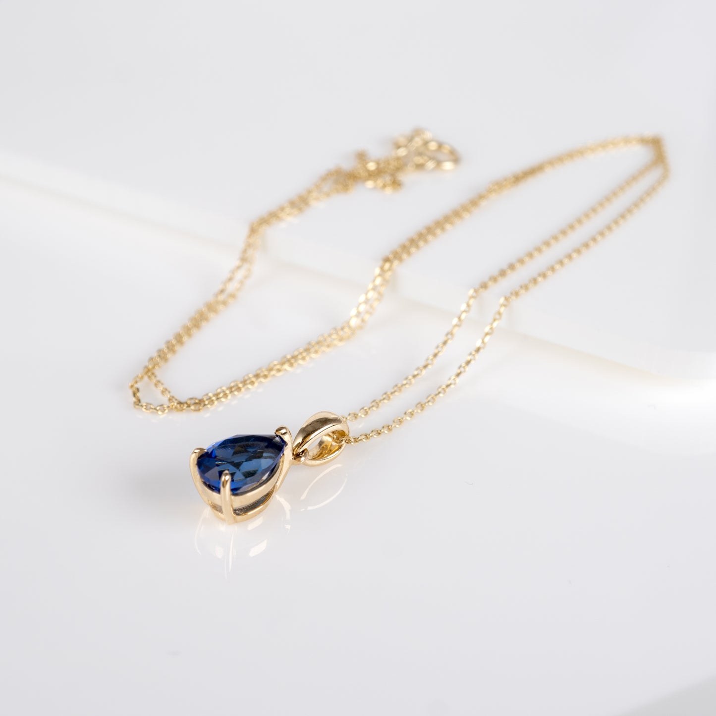 9ct Gold Pear Cut Blue Sapphire Solitaire Pendant Necklace with chain