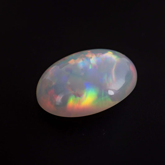 Ethiopian Opal and diamond dress ring