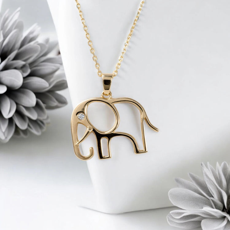 gold elephant pendant