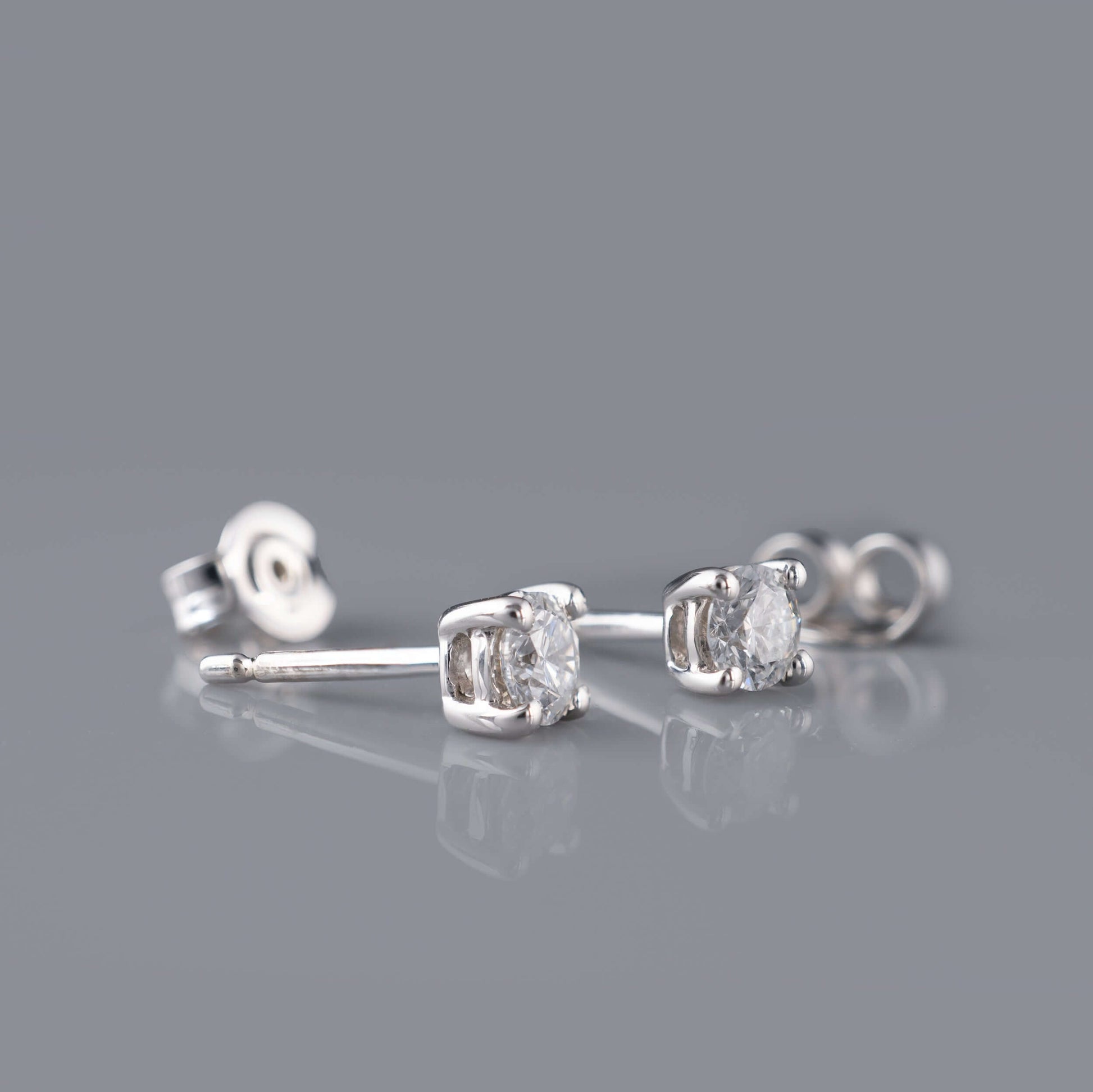 Female diamond stud earrings