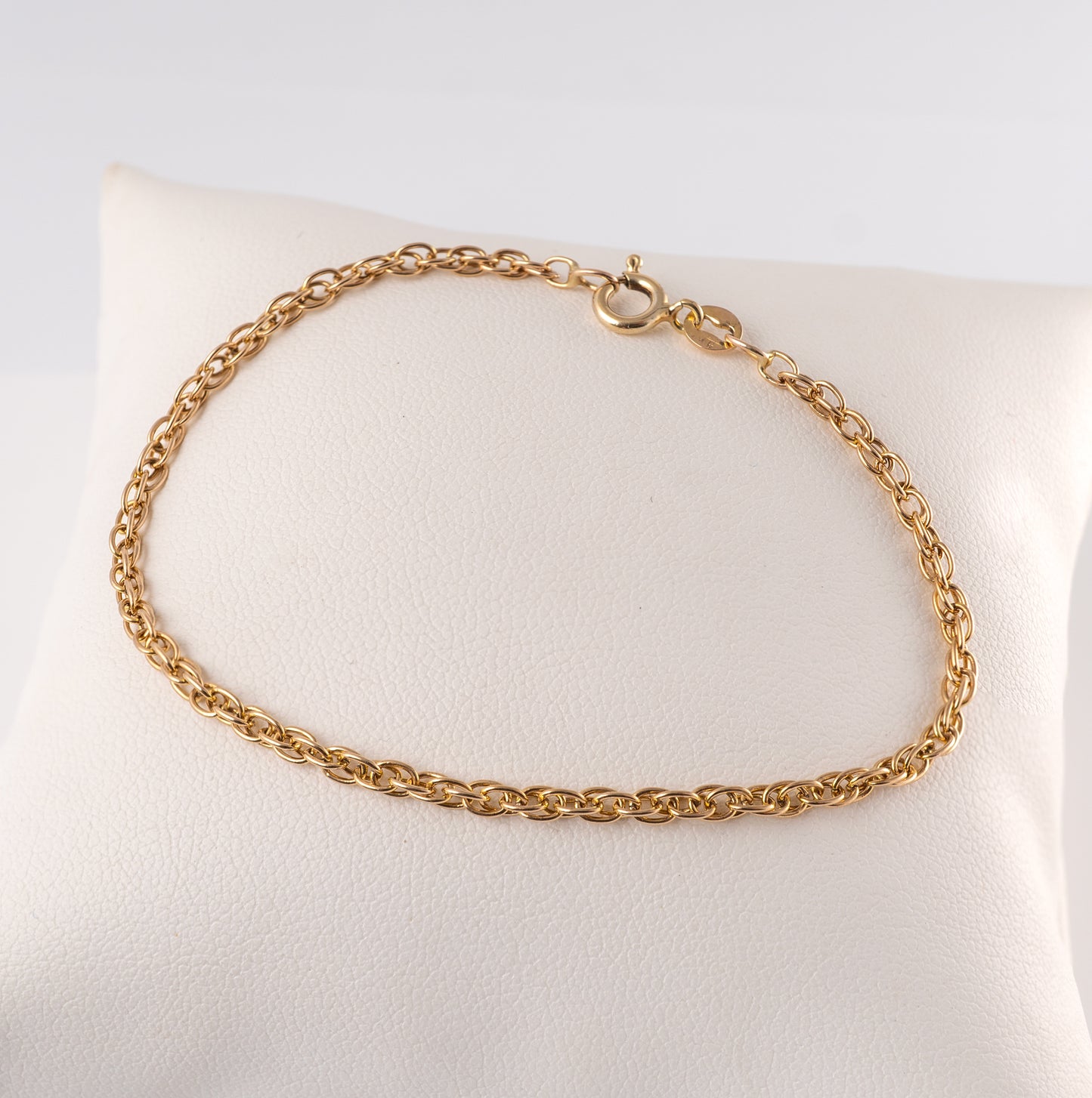 Pre-owned 375 gold fancy link bracelet displayed on a cushion – Hunters Fine Jewellery