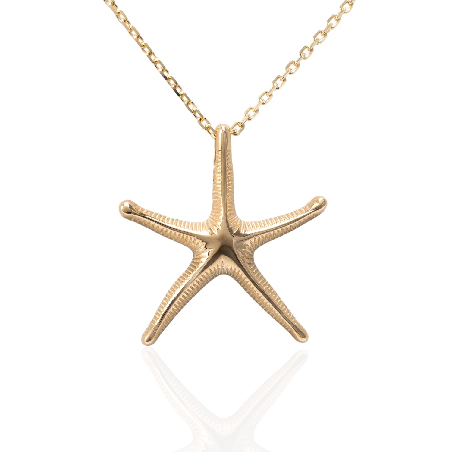 375 gold starfish necklace on white background