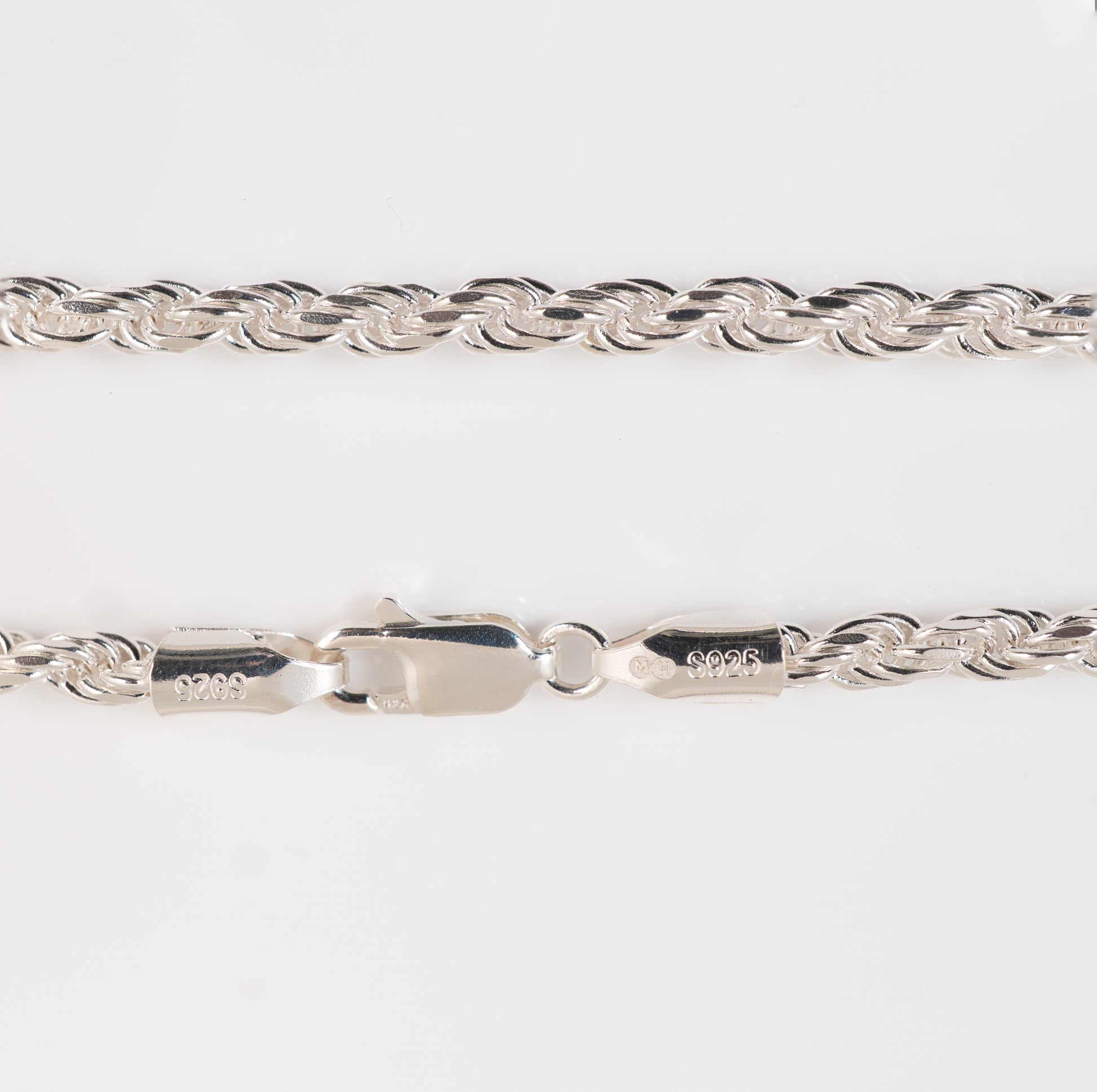 Close-up of sterling silver rope bracelet clasp and end caps