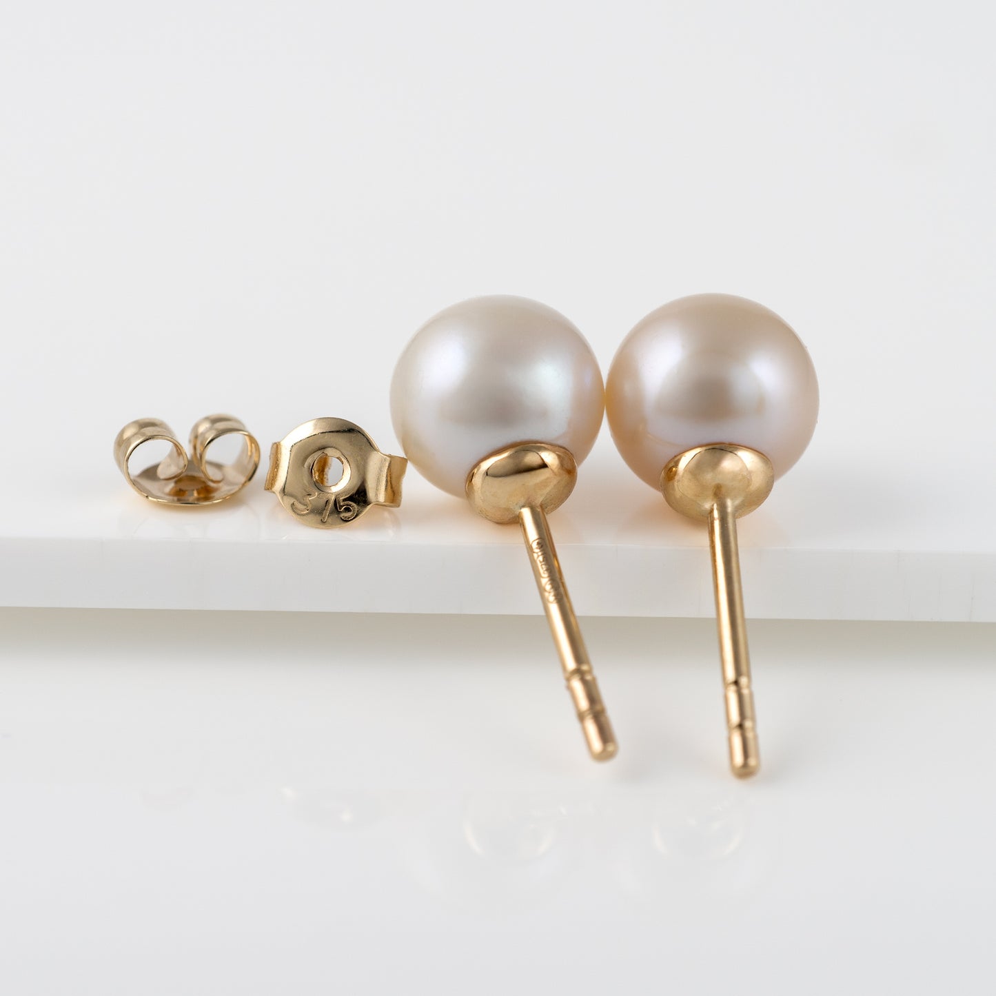 pair pearl studs earrings yellow gold hallmarked hunters fine jewellery