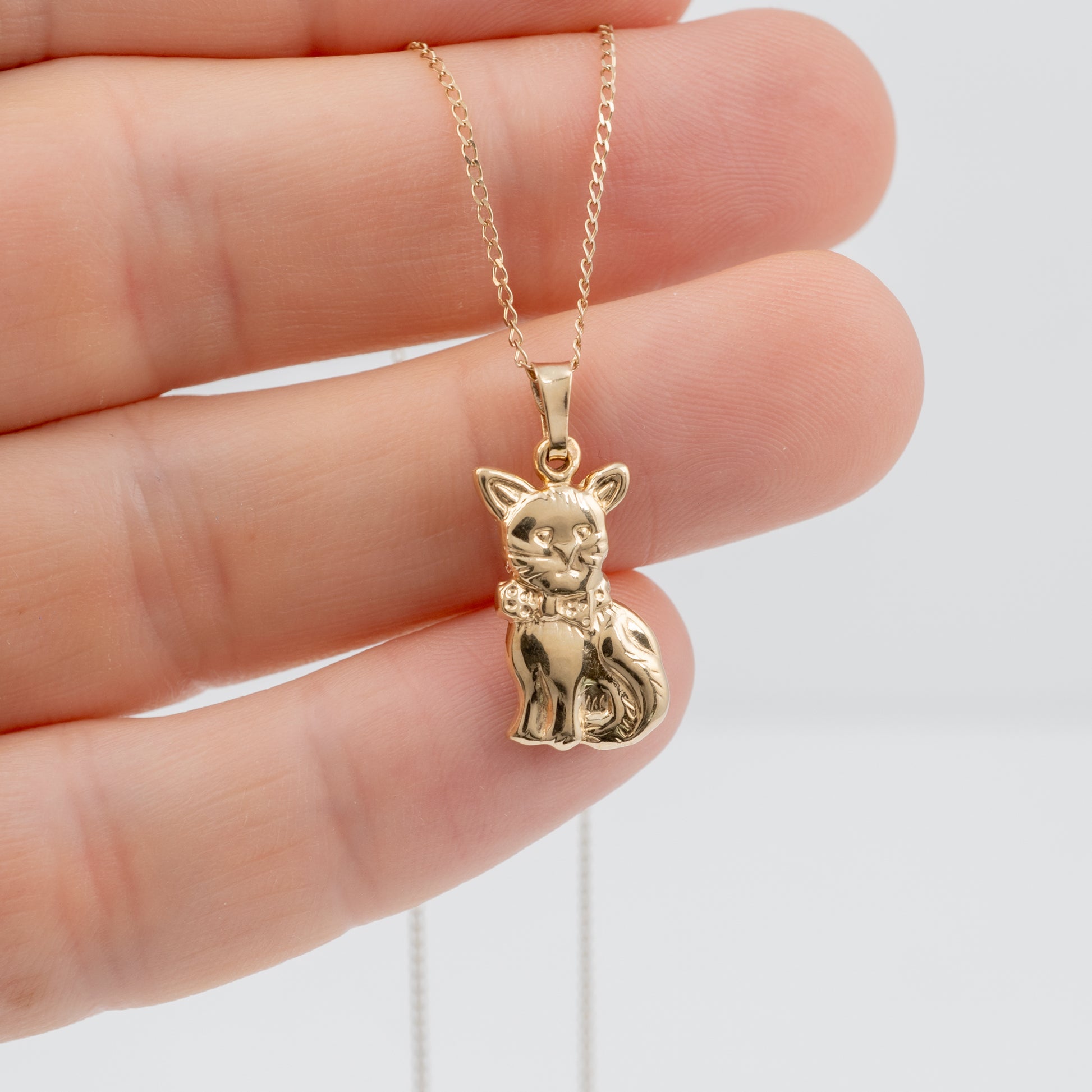 gold cat charm pendant