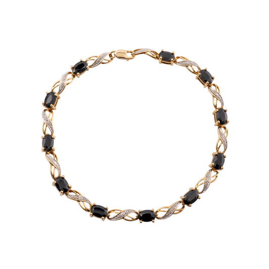 9ct gold blue sapphire bracelet for women with eleven oval-cut sapphires and diamond-accented infinity links