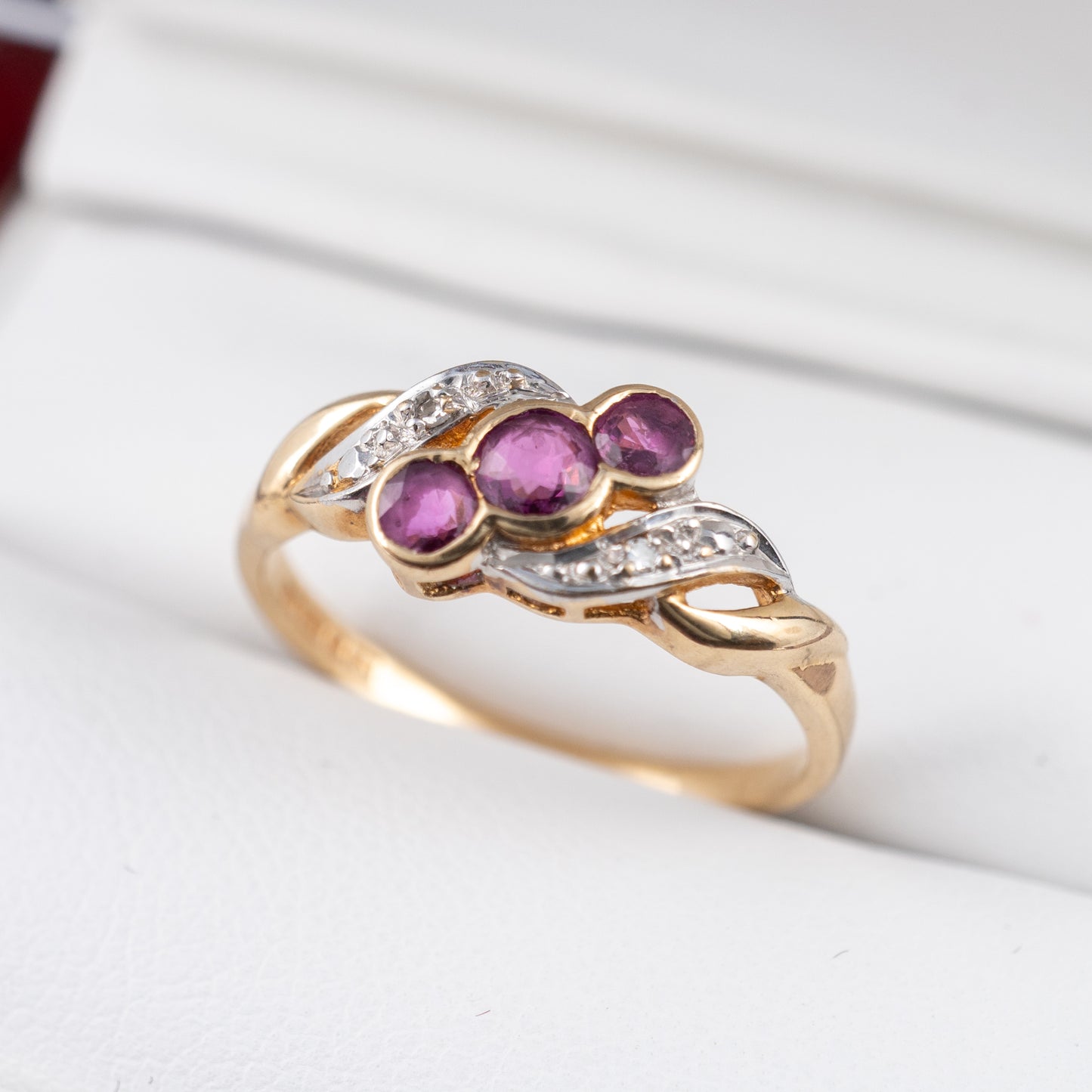 Close-up view of Vintage Ruby Ring – Trio of rubies set in 9ct Yellow Gold