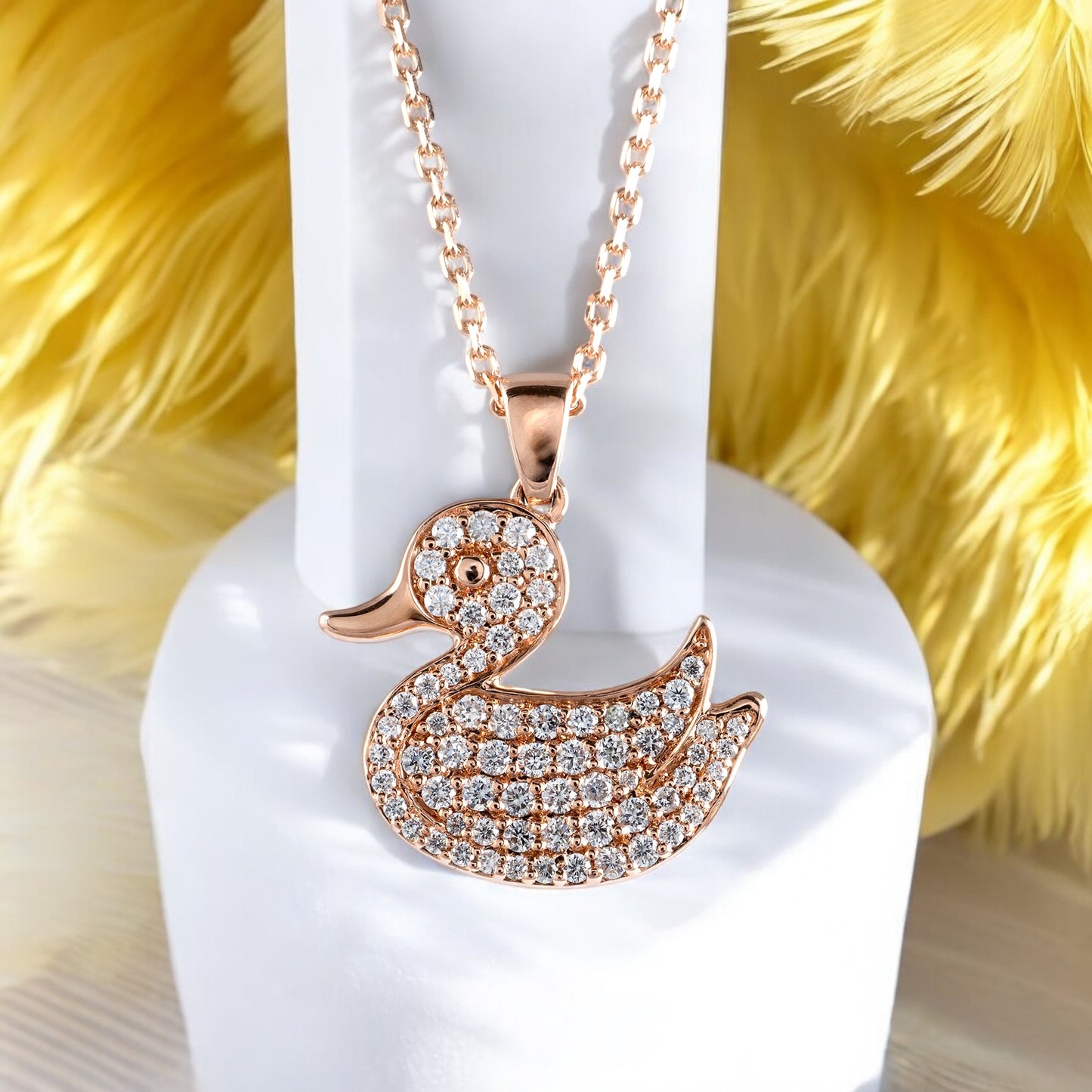 lab grown diamond duck necklace rose gold with yellow feathers lifestyle image