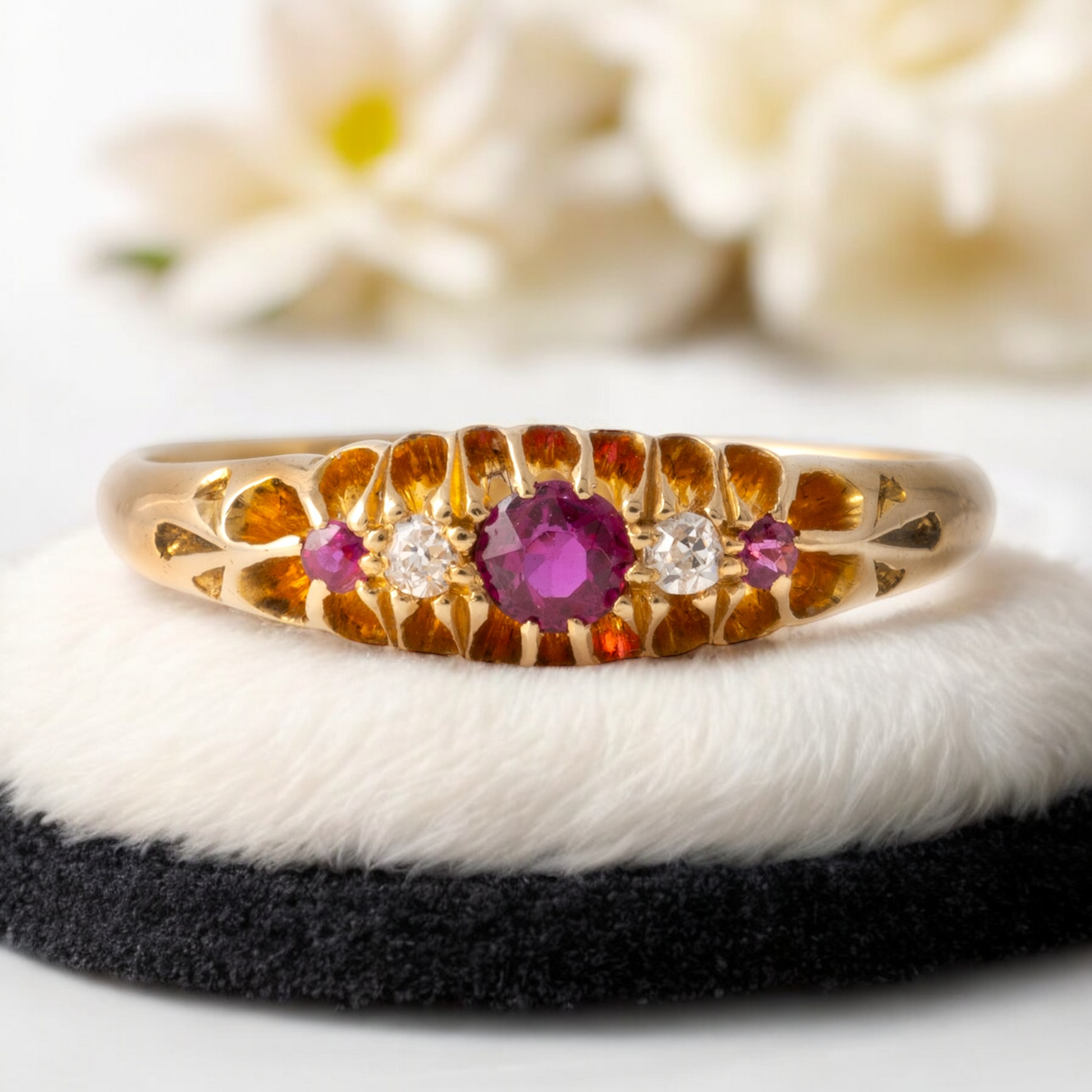 Edwardian ruby diamond ring displayed on soft pad | Hunters Fine Jewellery