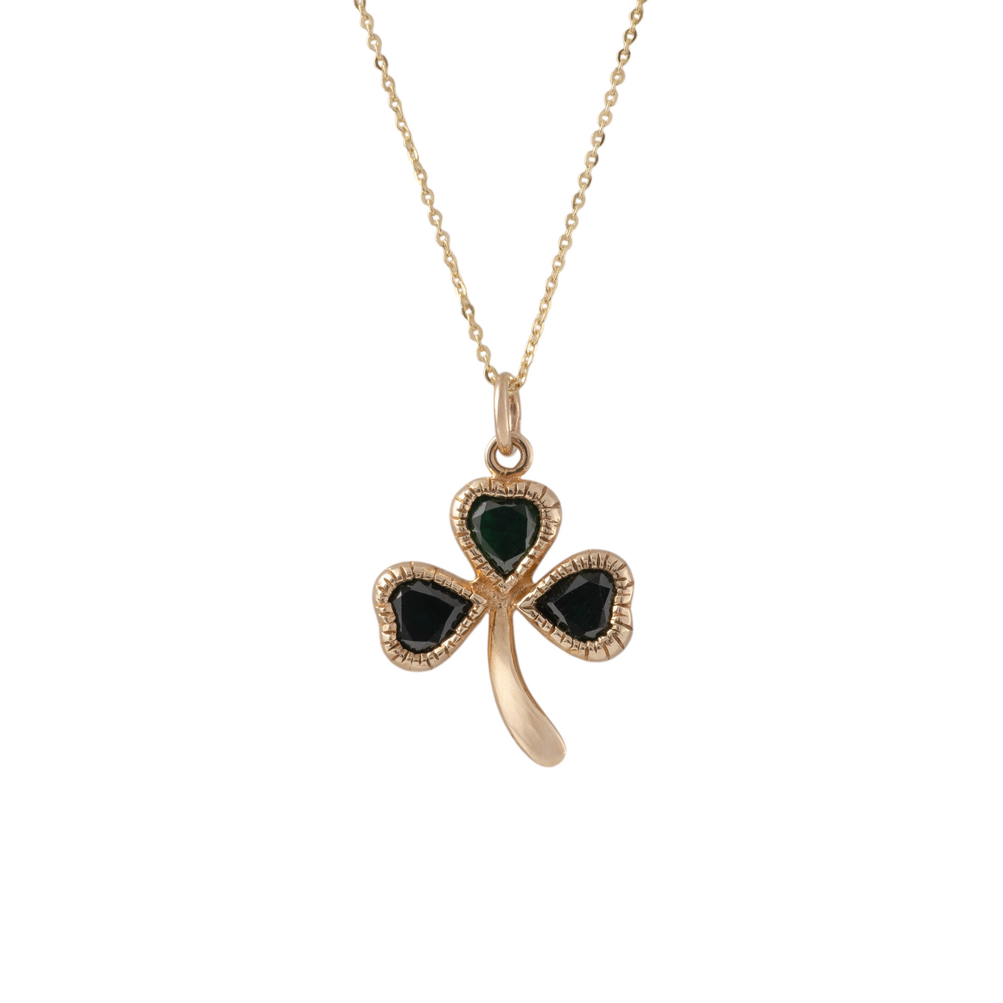 Gold shamrock necklace with green cubic zirconia gemstones, set in 9ct yellow gold