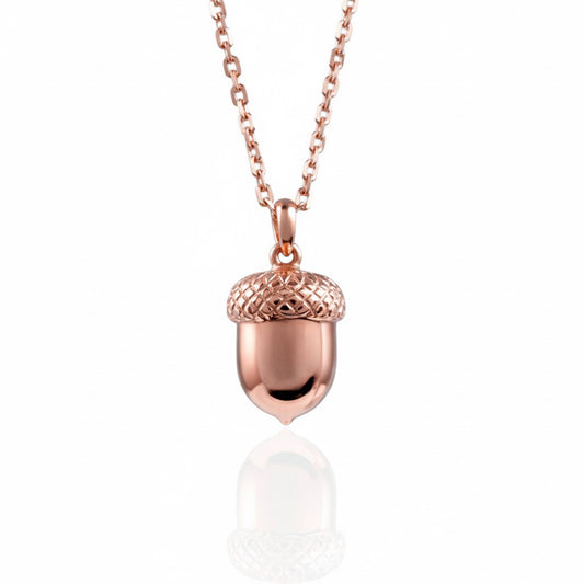 Rose gold acorn pendant white background 