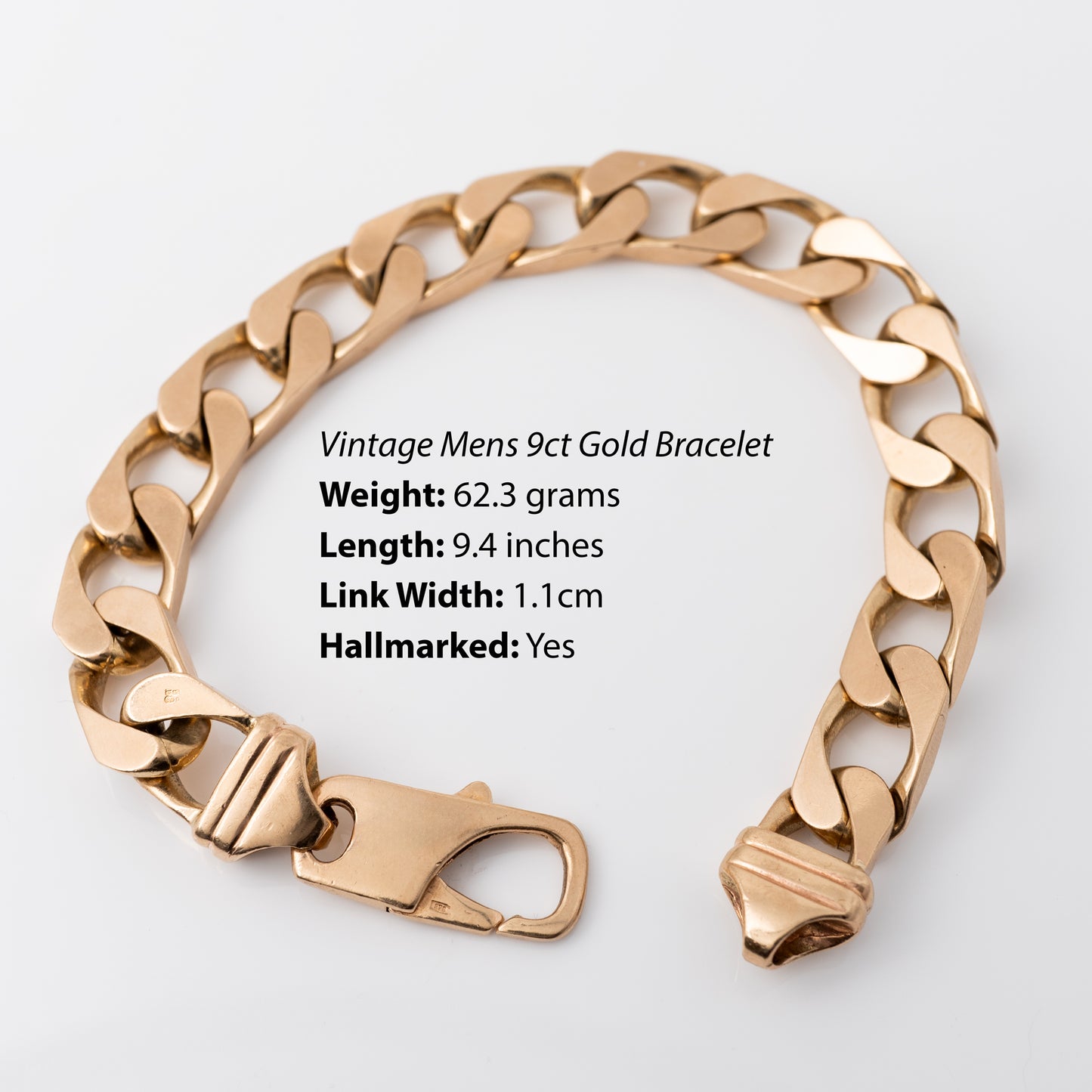 Mens vintage gold bracelet with interlocking flat curb links, circa 1990s text info detailing its length and heavy weight