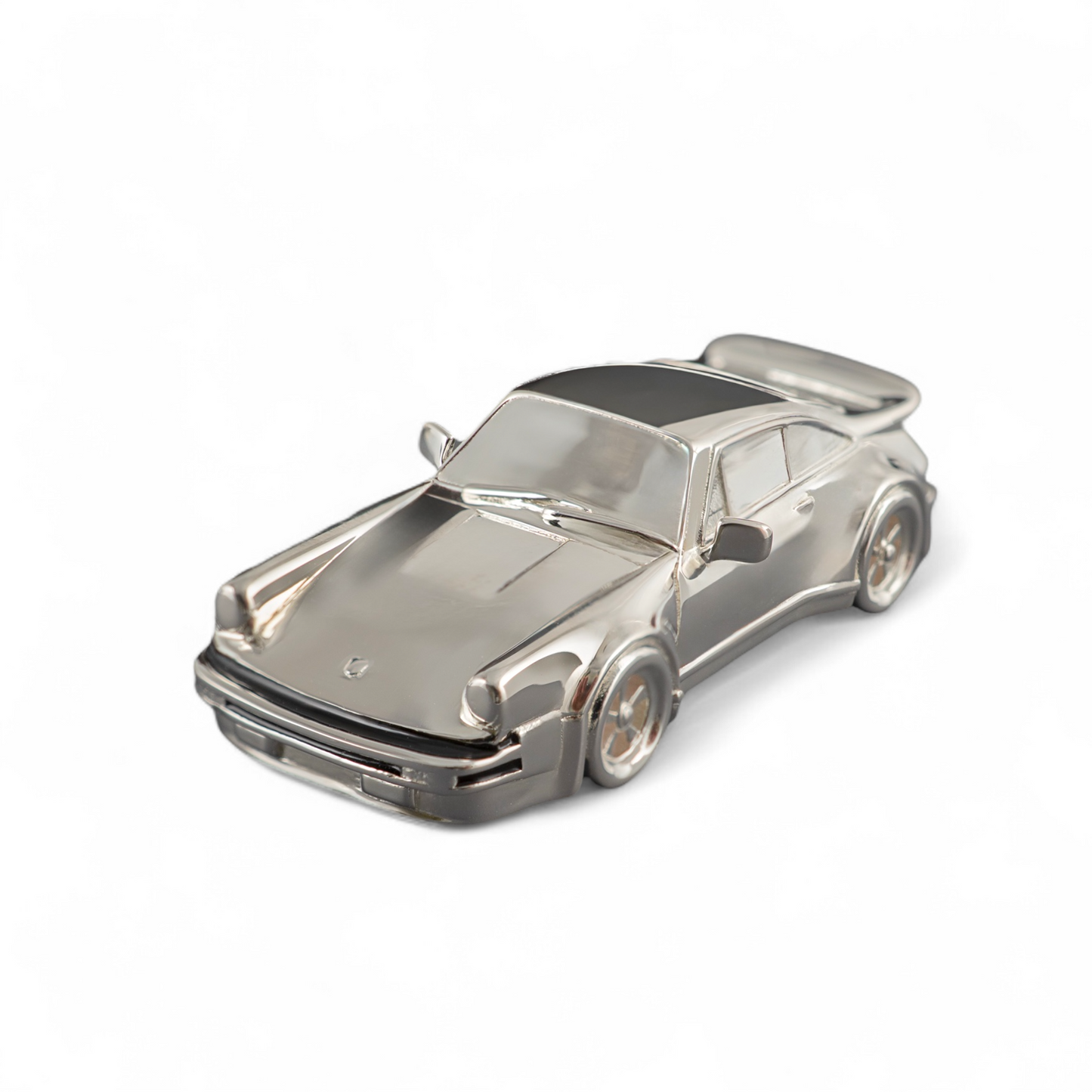 sterling silver car miniature on a white background