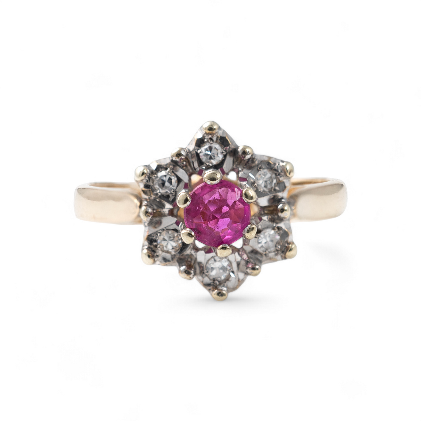 Ruby engagement ring in 9ct yellow gold with diamond halo, floral design