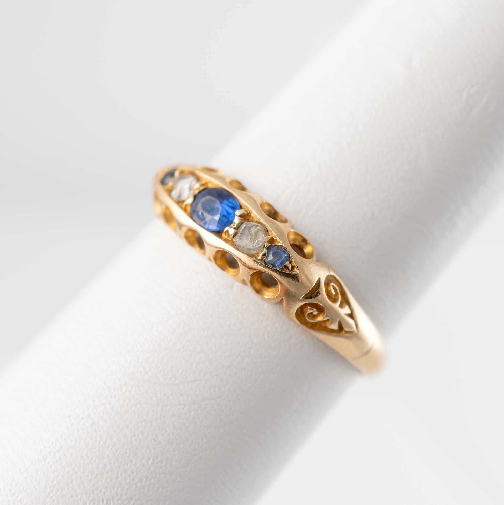 Side profile of antique sapphire and diamond gypsy ring