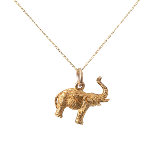 Solid gold elephant necklace with realistic skin texture