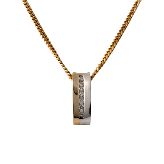 Two-tone gold diamond bar necklace with seven tension-set diamonds on a yellow gold curb chain, front view showing curved pendant design