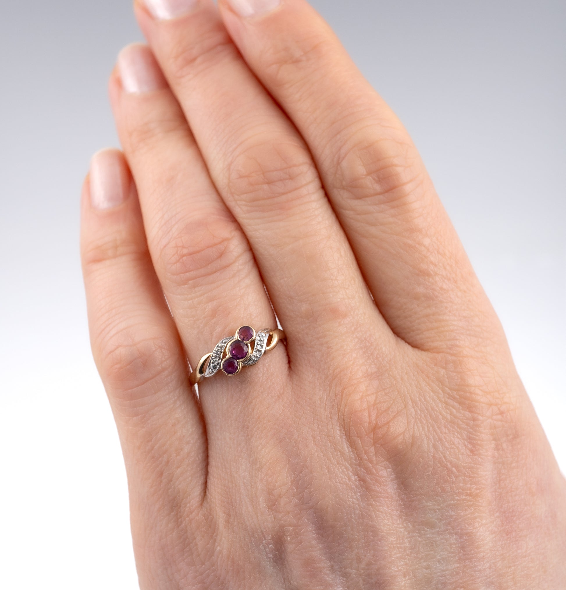 Vintage Ruby and Diamond Ring in 9ct Yellow Gold displayed on hand