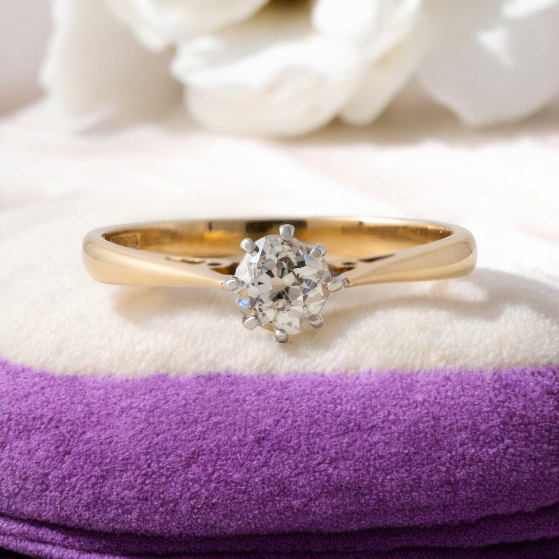 Vintage old cut diamond engagement ring set in 9ct gold with European cut diamond on a soft purple cushion – Hunters Fine Jewellery