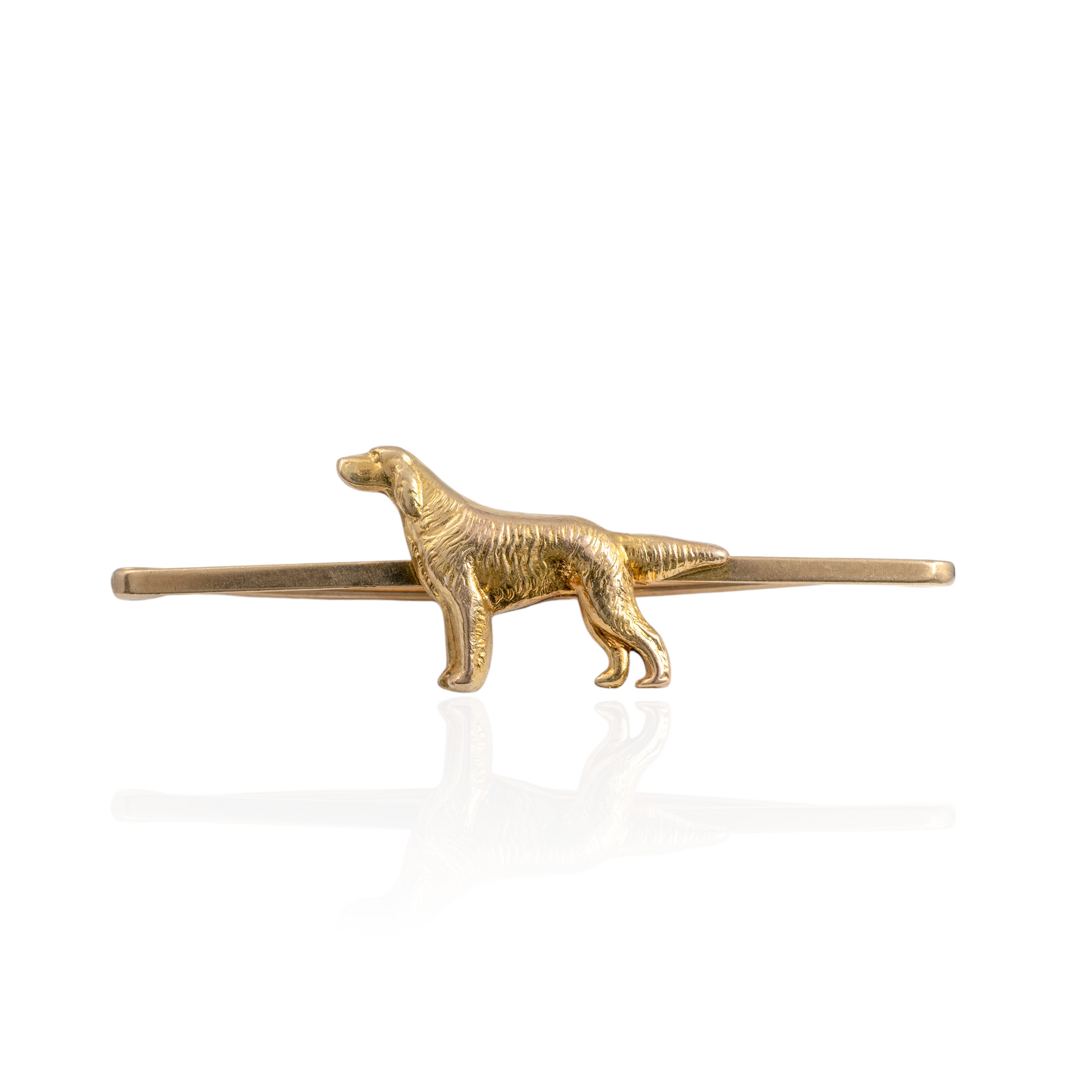 Vintage 9ct gold dog brooch featuring a Golden Retriever, set on a bar with pin