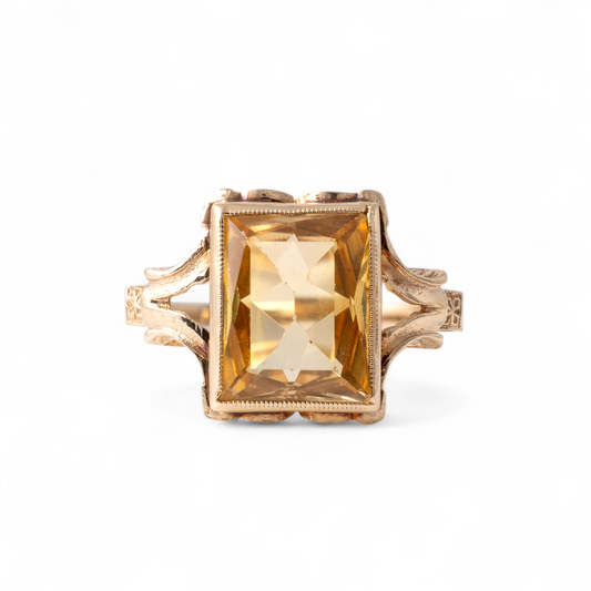 Vintage citrine ring in 9ct gold by Hunters Fine Jewellery, featuring a rectangular pale citrine gemstone with intricate bifurcated shoulders