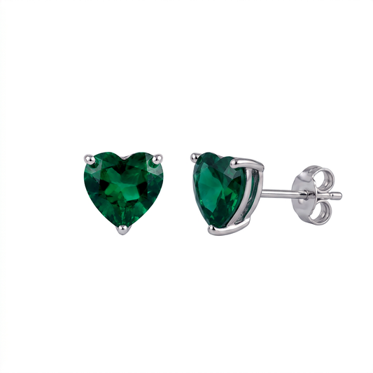 Lab grown emerald heart stud earrings in rhodium-plated sterling silver, front and side view showing the post and butterfly back