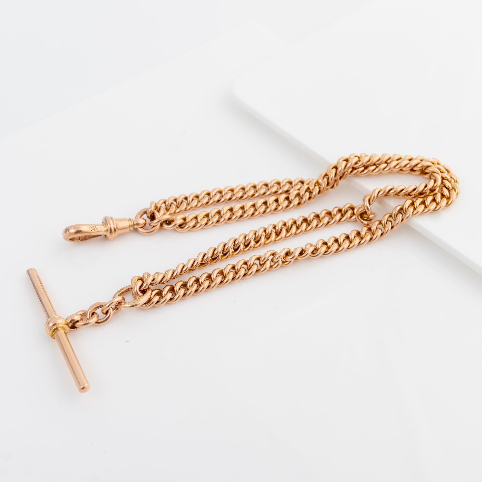 Antique Double Albert watch chain showing two graduated curb-link chains and T-bar