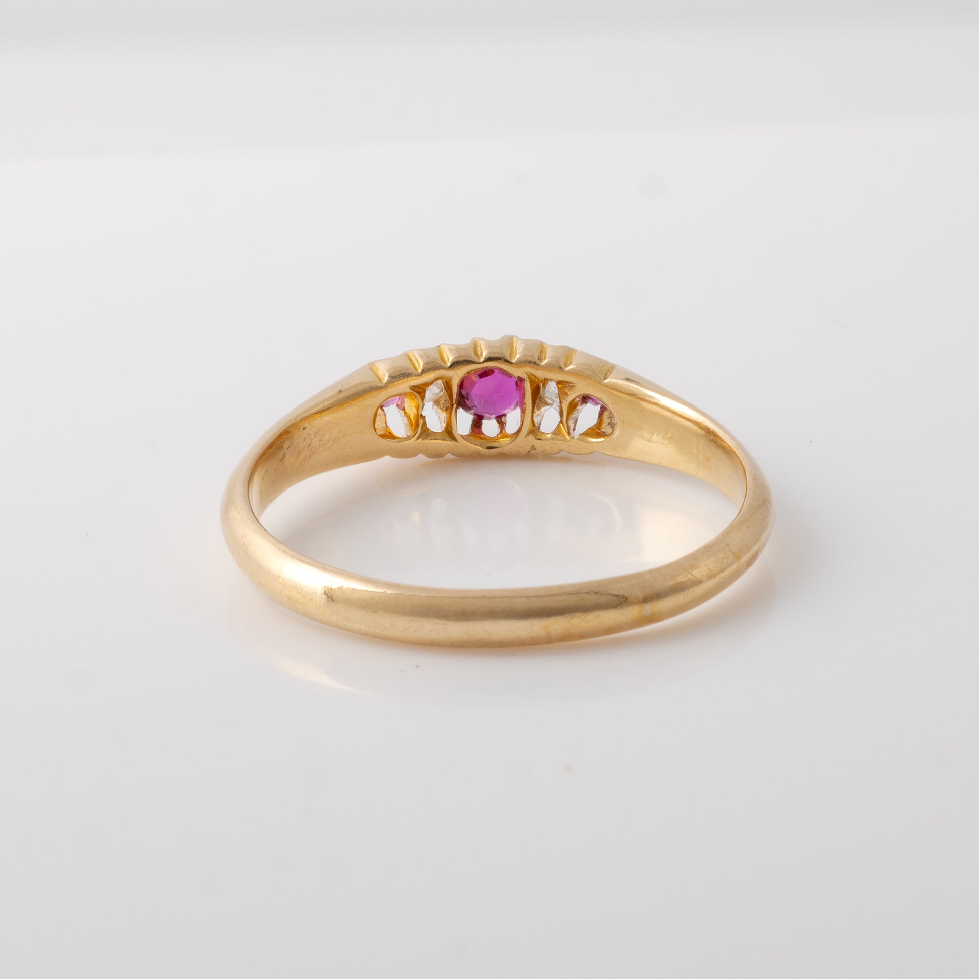 Edwardian ruby and diamond ring in 18ct yellow gold, rear view showcasing the band and shank