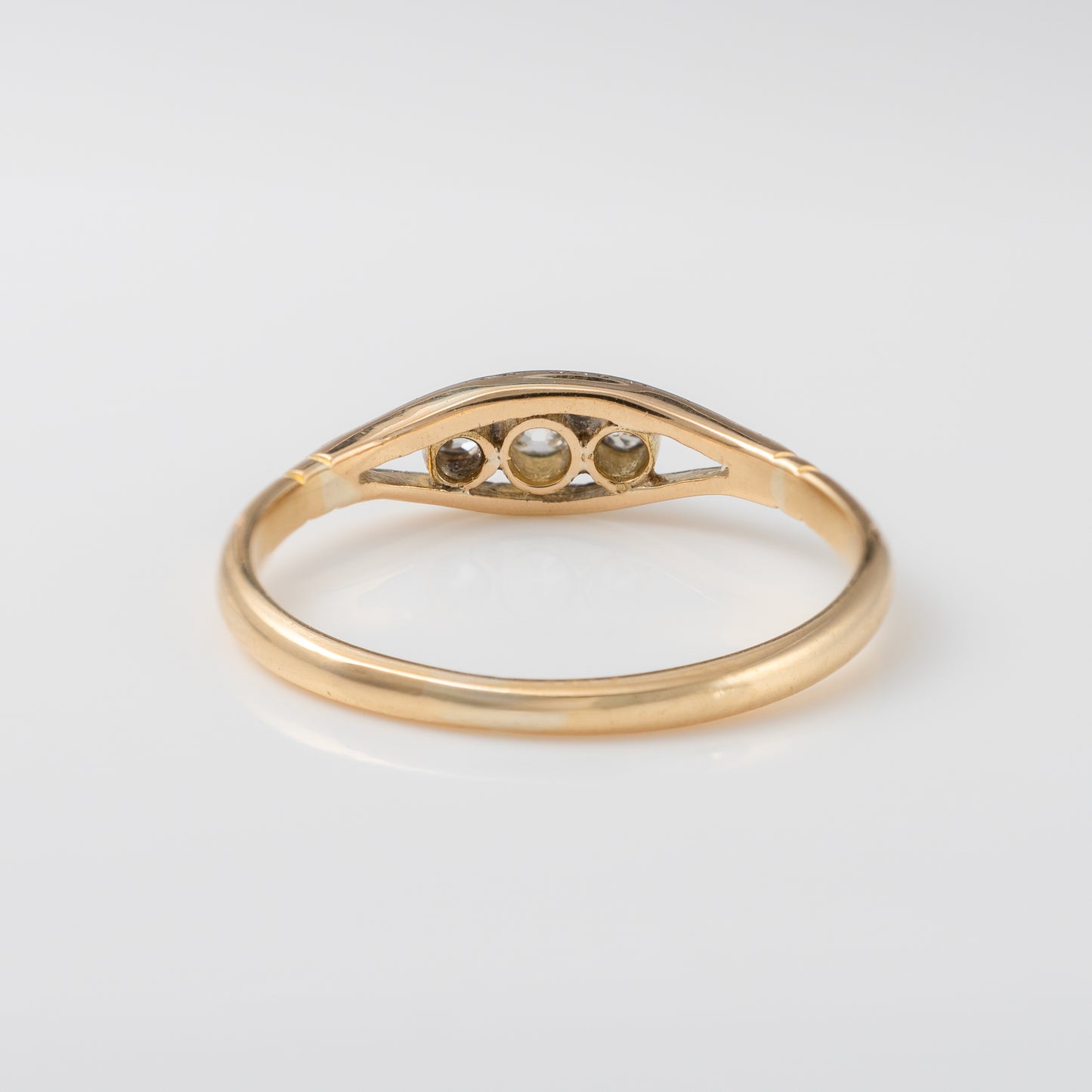 Back view of vintage diamond ring in 18ct gold, showing smooth shank