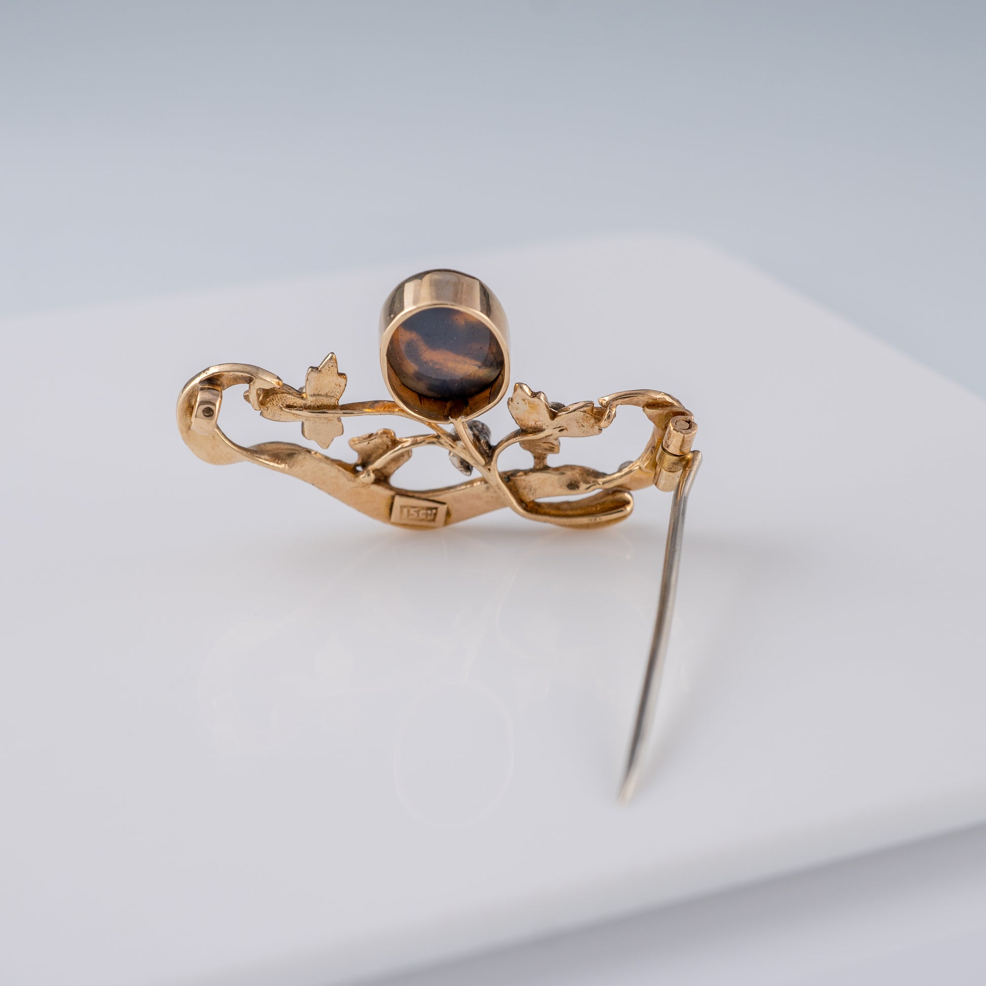 Antique opal brooch with open pin and curved back