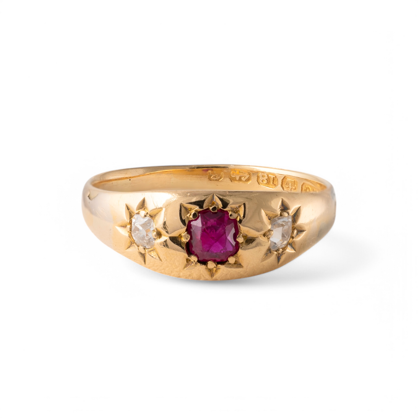 Antique 18ct gold ruby and diamond gypsy ring with star-set gemstones, front view.