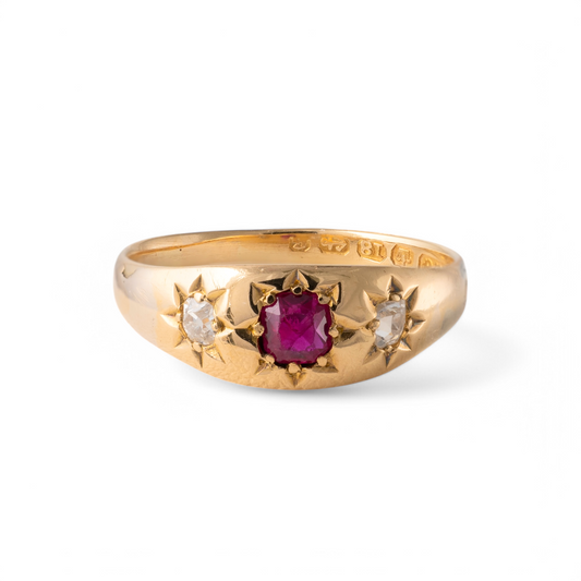 Antique 18ct gold ruby and diamond gypsy ring with star-set gemstones, front view.