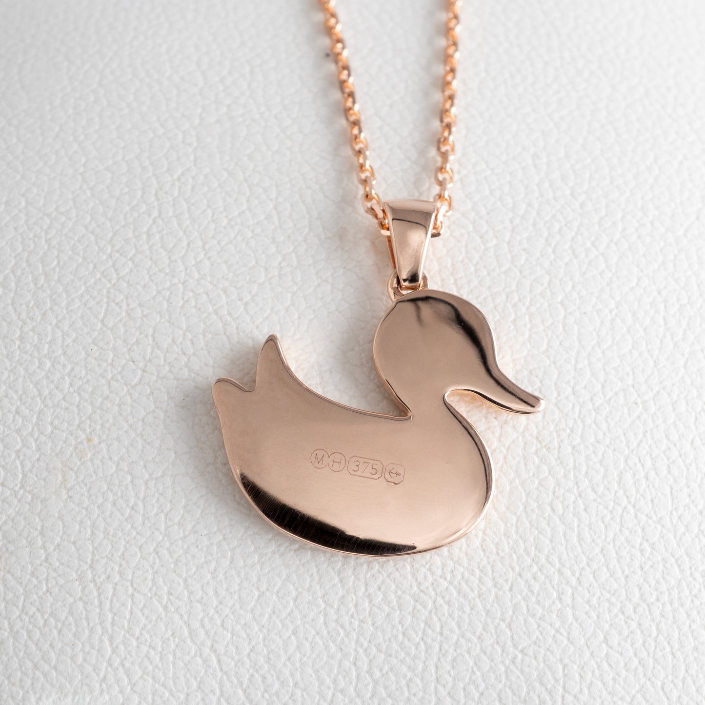 rose gold duck necklace with assay hallmarks hunters fine jewellery stamp