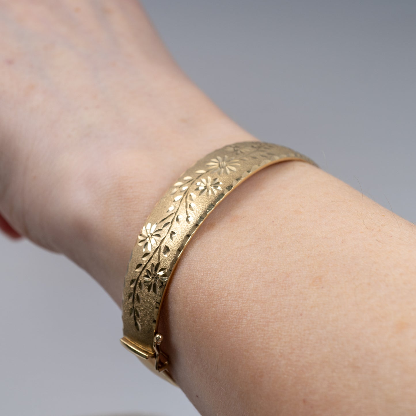 Gold Bangle with Matte Finish and Diamond Detail
