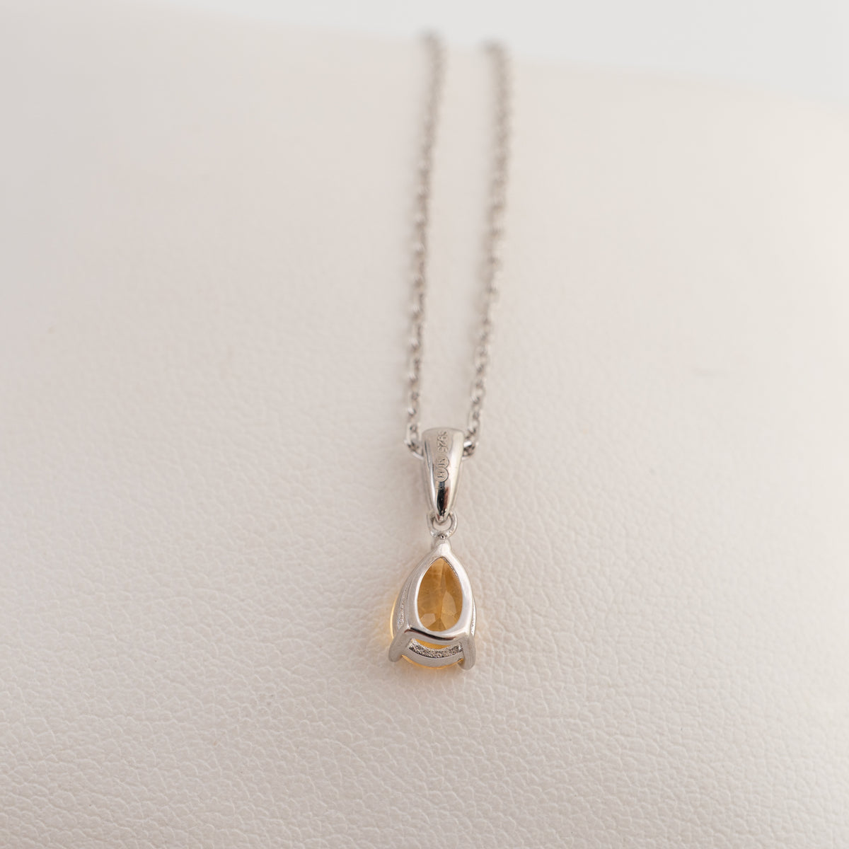 Rear view of the citrine teardrop pendant in sterling silver.