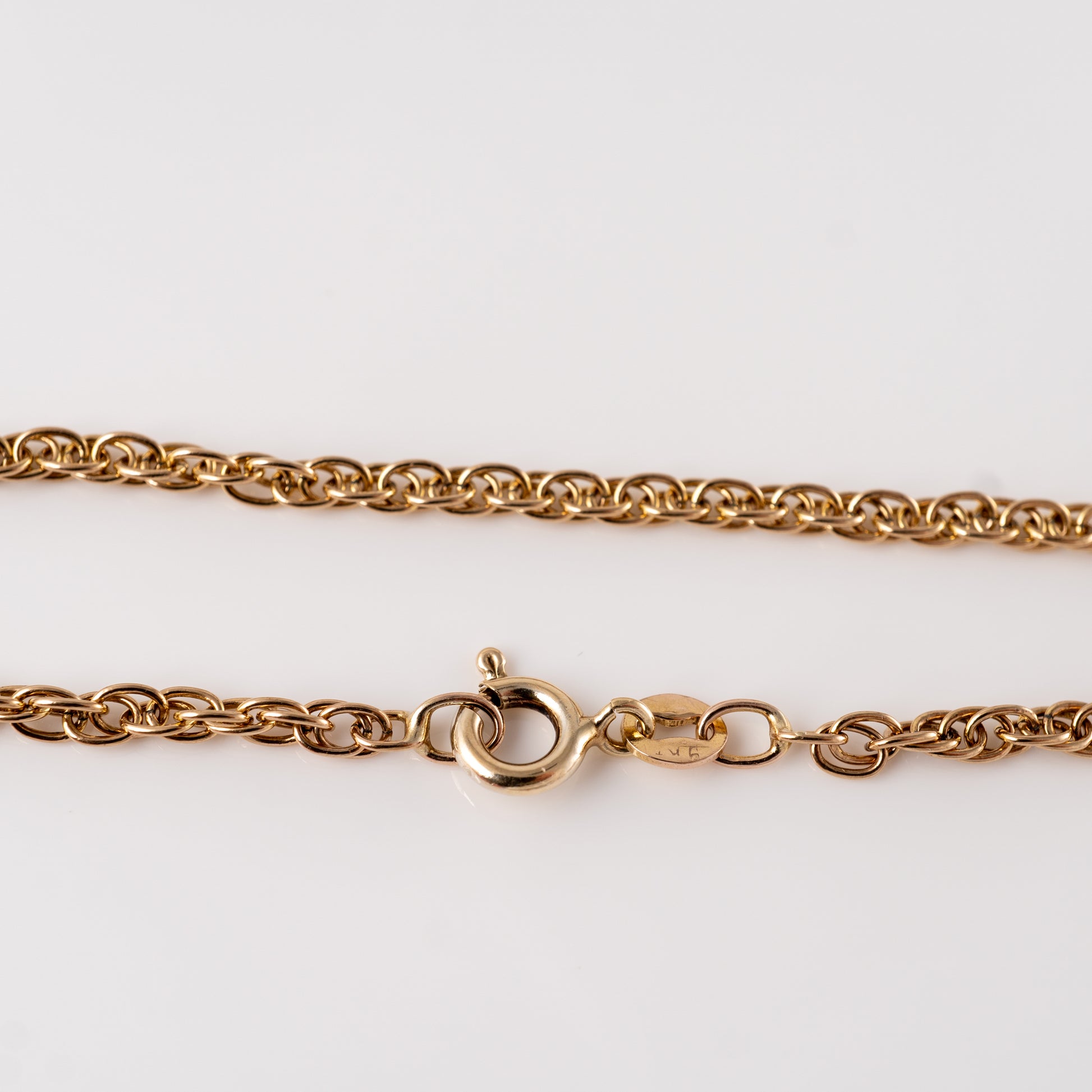 Close-up of the spring ring clasp and hallmark on a 375 gold fancy link bracelet – Hunters Fine Jewellery