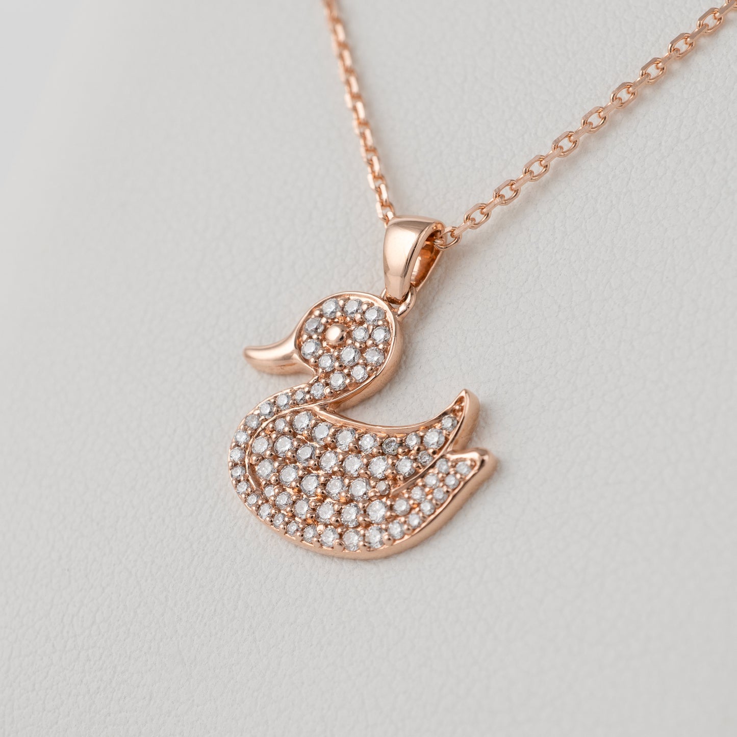 Lab grown diamond duck pendant necklace, side view