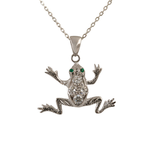 diamond frog pendant with green eyes on a chain against a white background