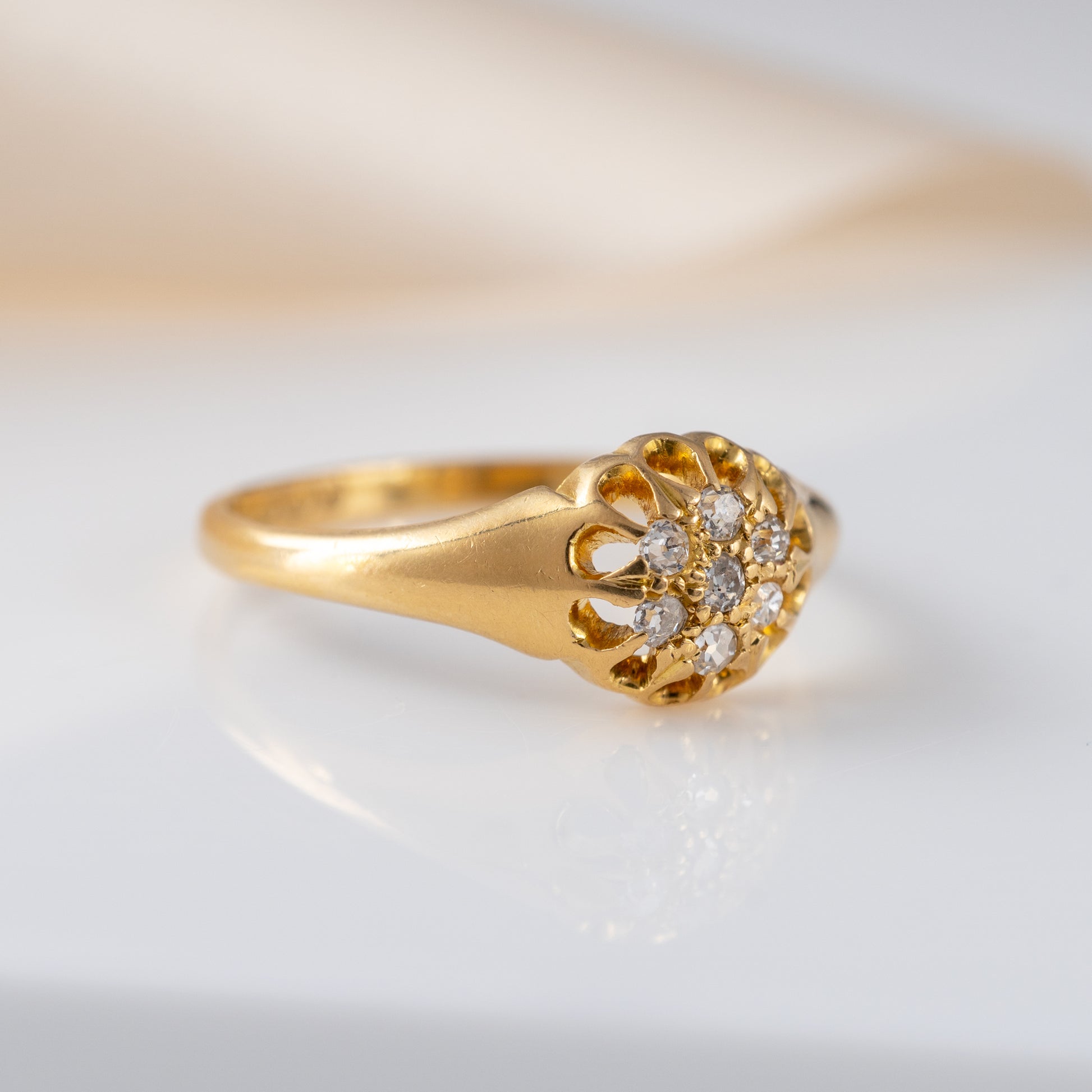 diamond cluster ring antique 18ct gold close up 