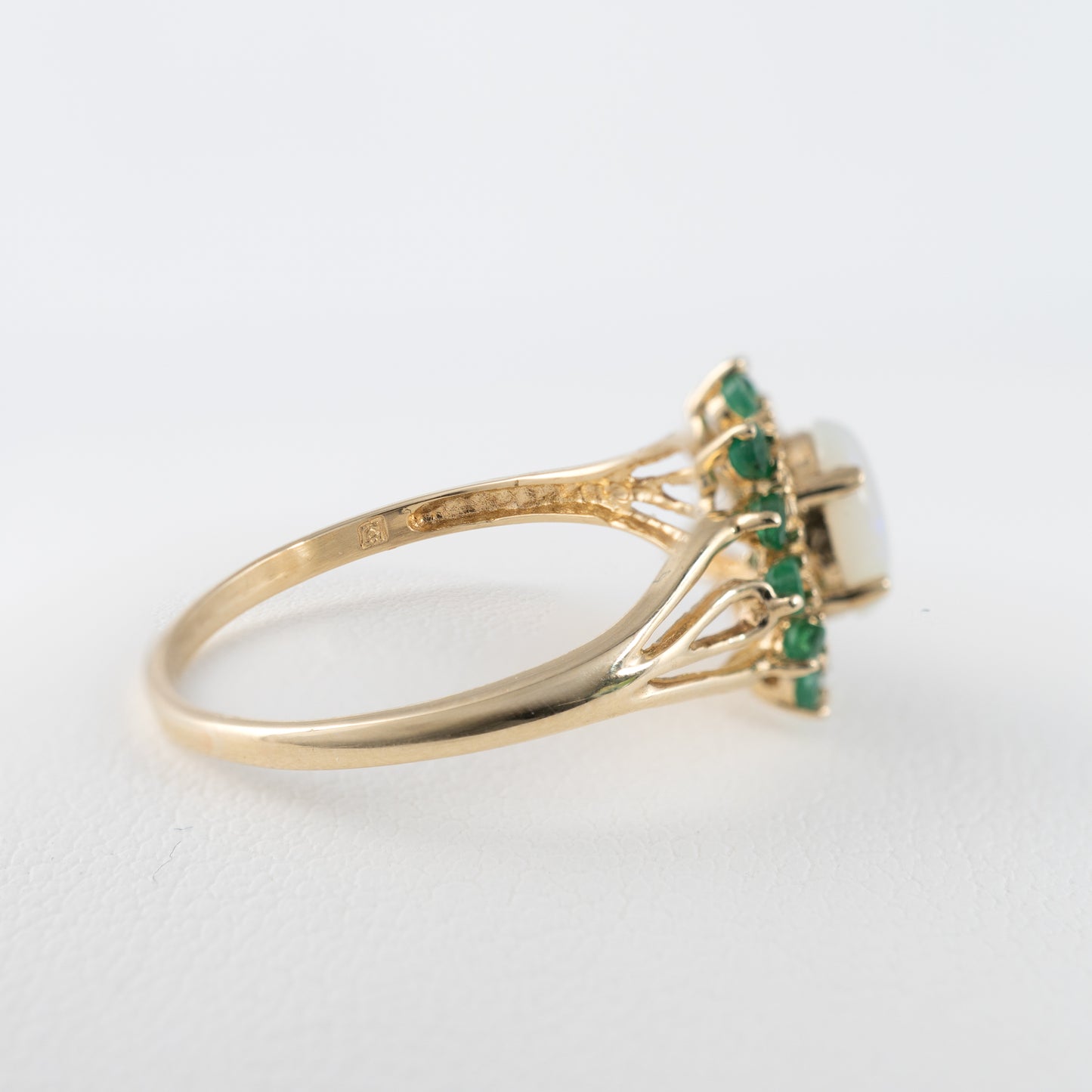 9ct gold flower ring with opal and emeralds