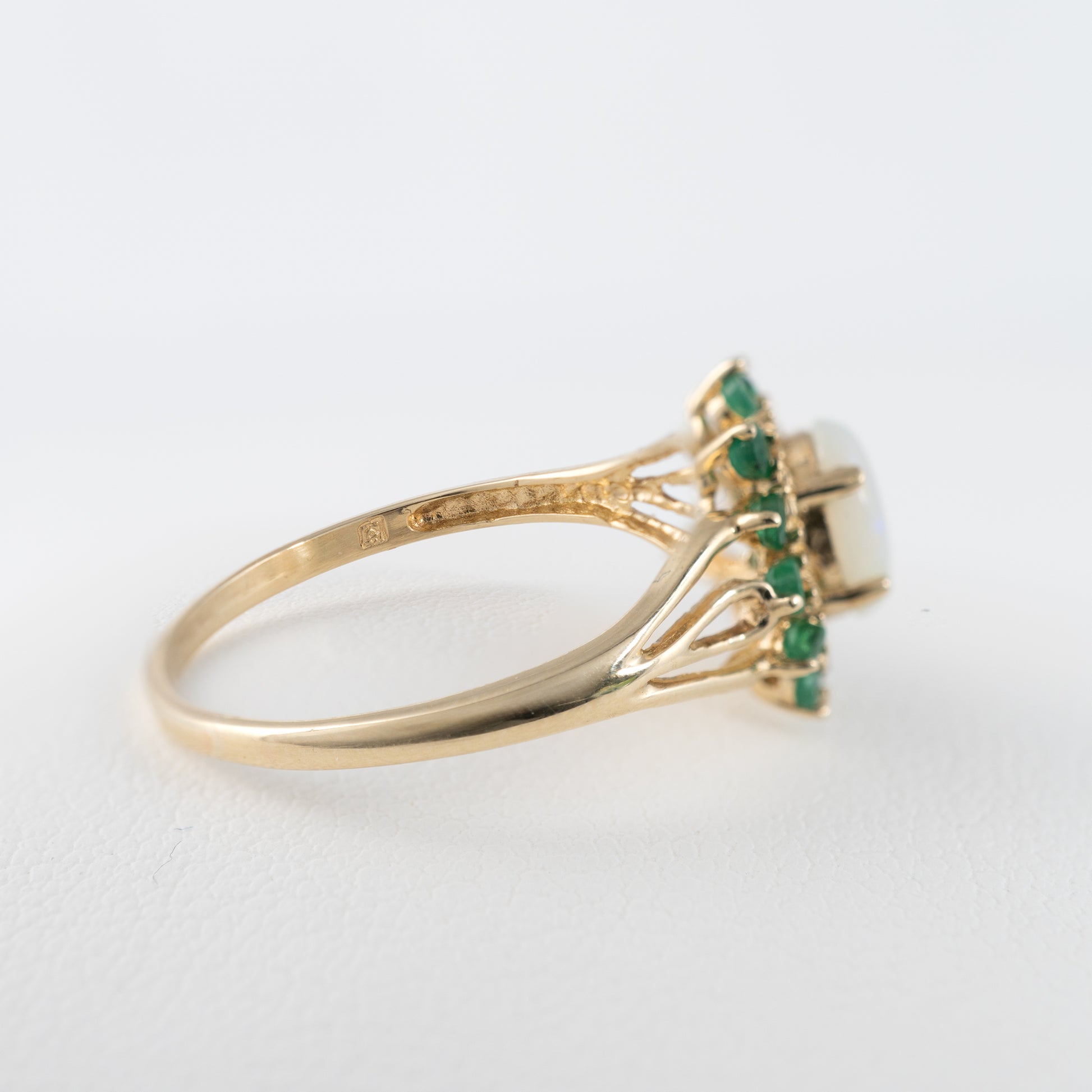 9ct gold flower ring with opal and emeralds