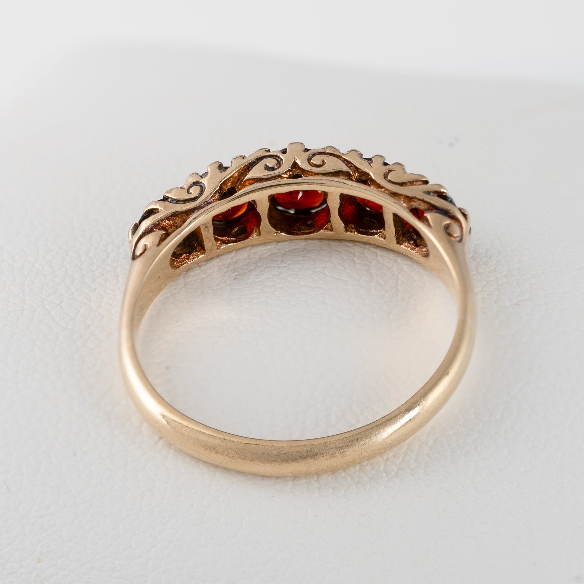 yellow gold five stone garnet ring back view of setting 