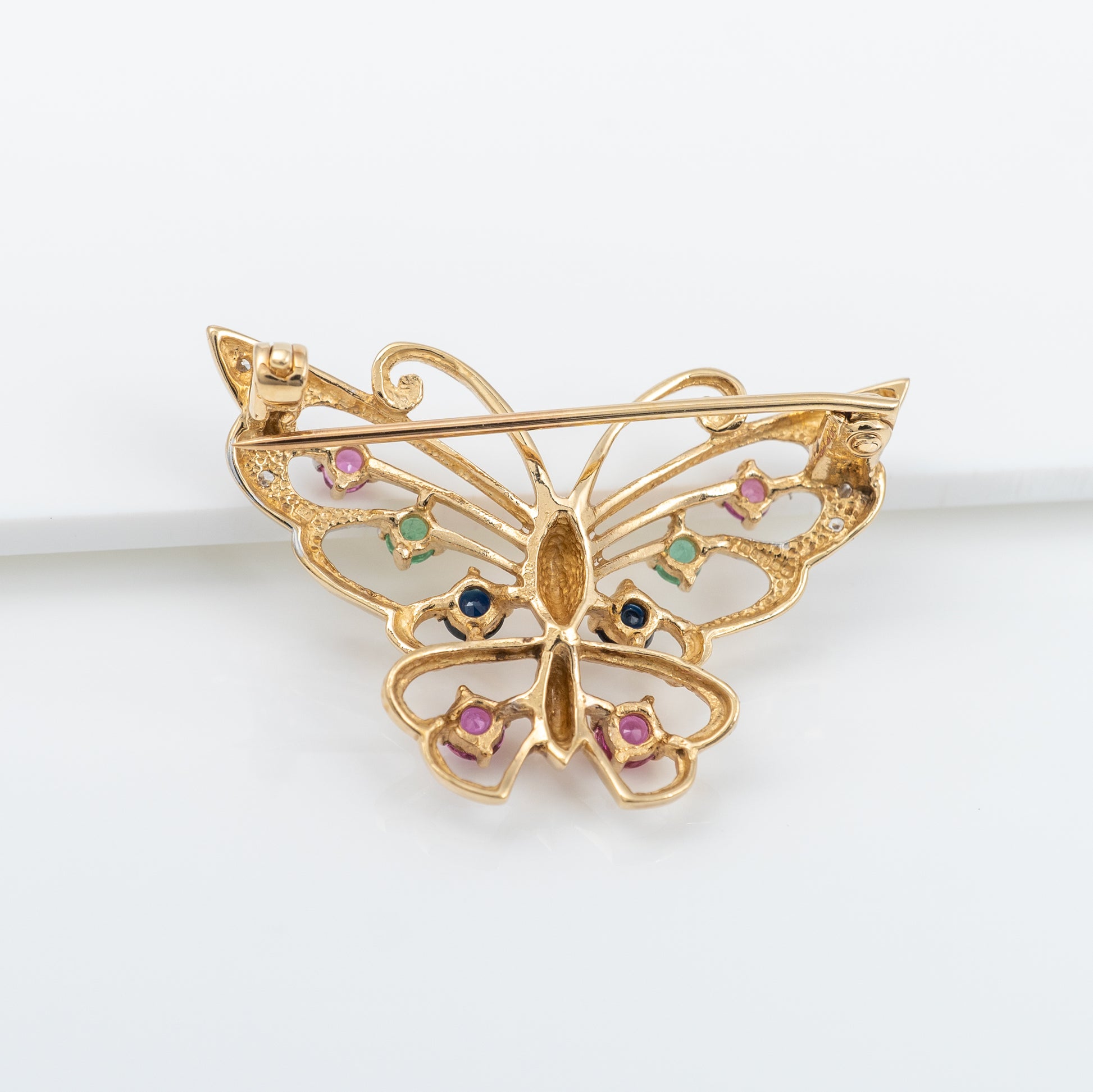 gold butterfly brooch reverse