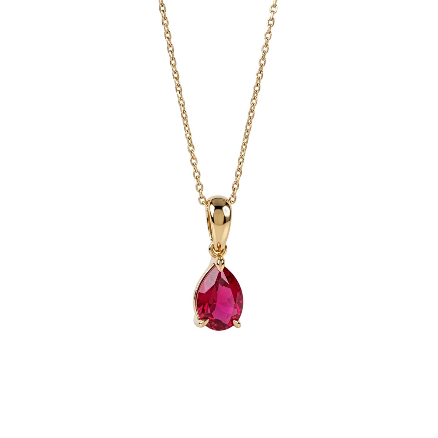 A gold pendant necklace featuring a teardrop-shaped lab ruby gemstone, suspended from a delicate gold chain against a plain white background.