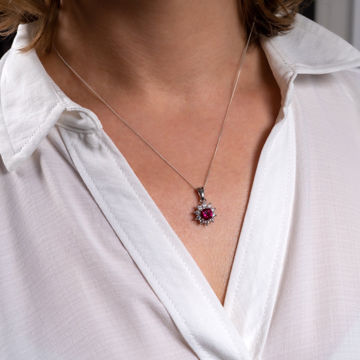 woman wearing lab grown ruby pendant necklace 