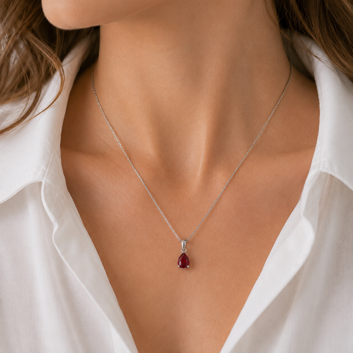 lab ruby necklace on a models neck