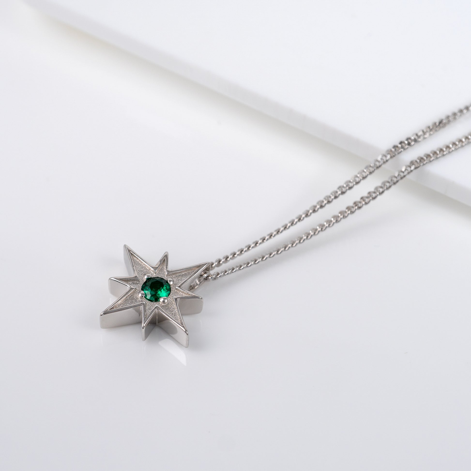 north star necklace in sterling silver with emerald green gemstone